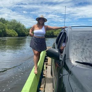 Cute flower skirt. Very flattering and fun to dress up with crop tops!